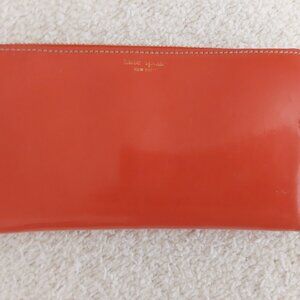 Kate Spade Red Zip Around Organizer Wallet.   Size  4x7.5
